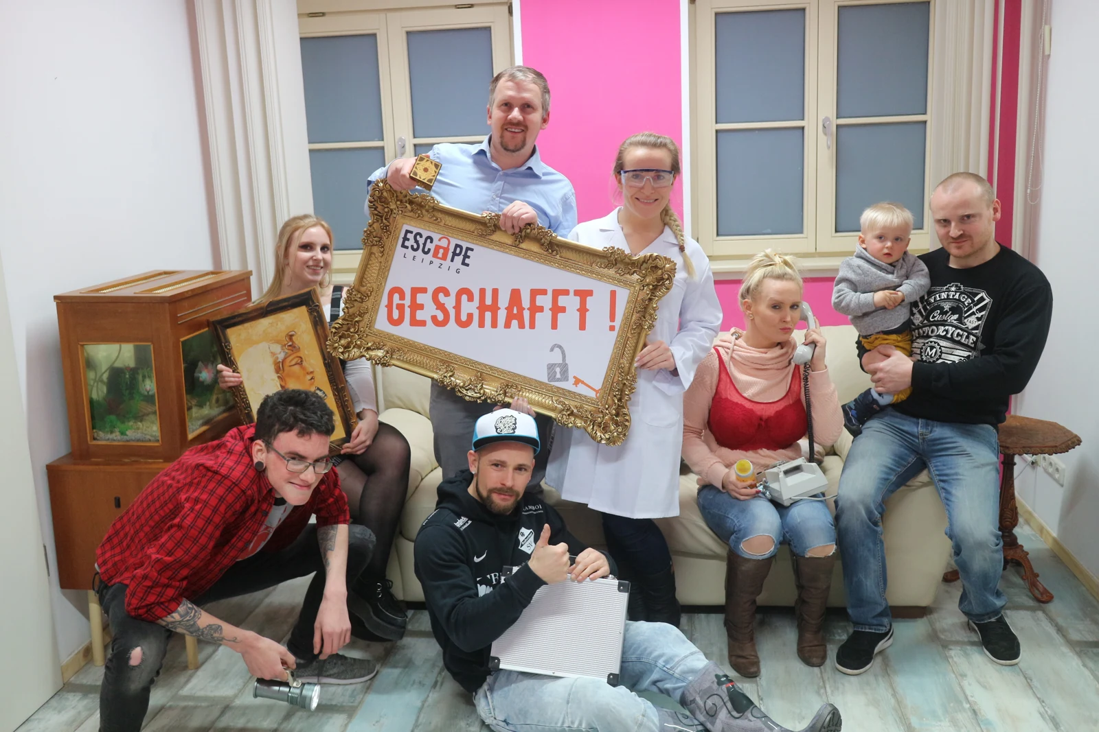 Family enjoying an escape room