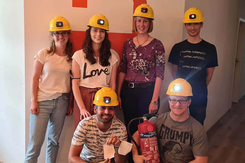 Team in the middle of an escape room adventure at Escape Hannover